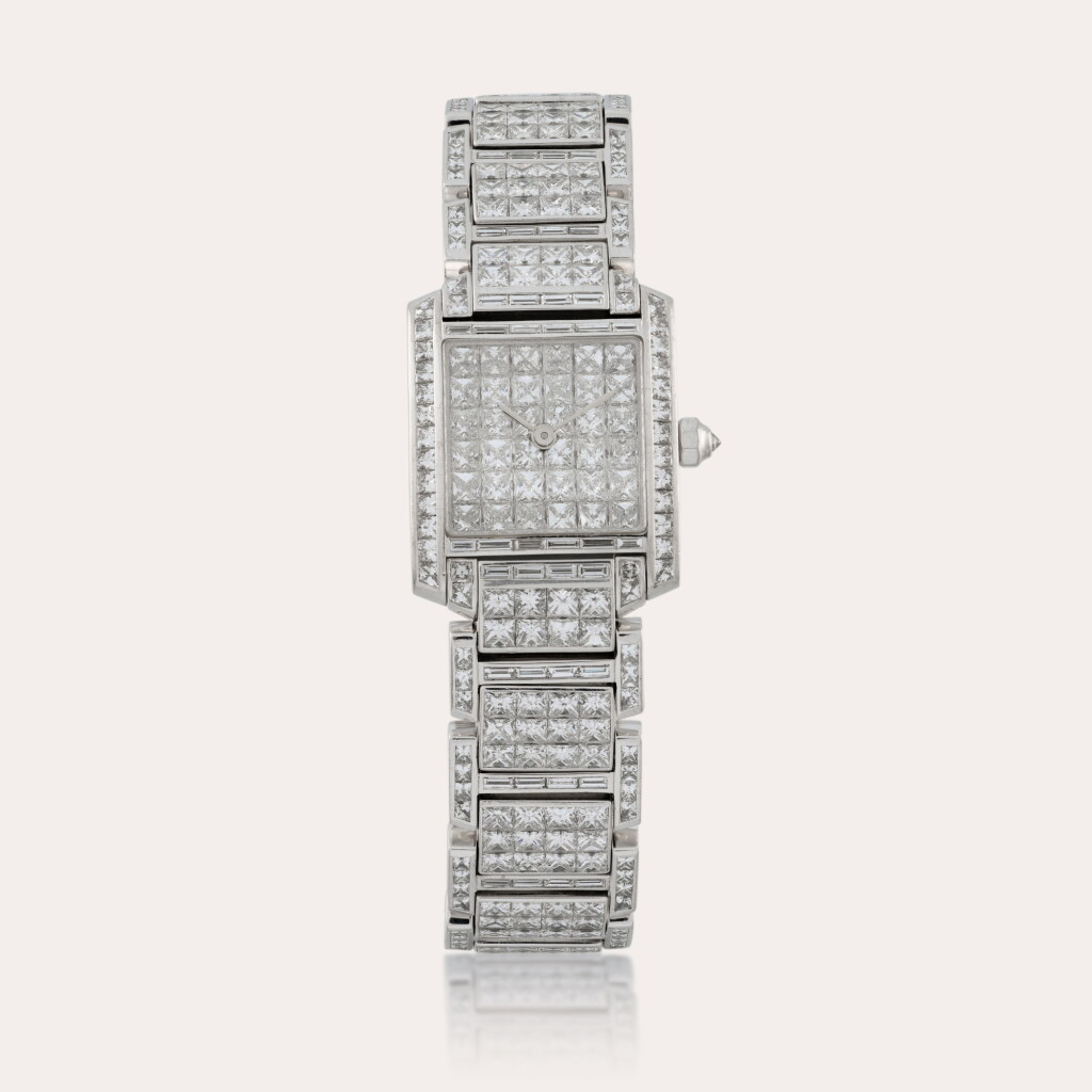 View full screen - View 1 of Lot 142. Tank Française | A white gold and diamond-set wristwatch with bracelet | Circa 1998.