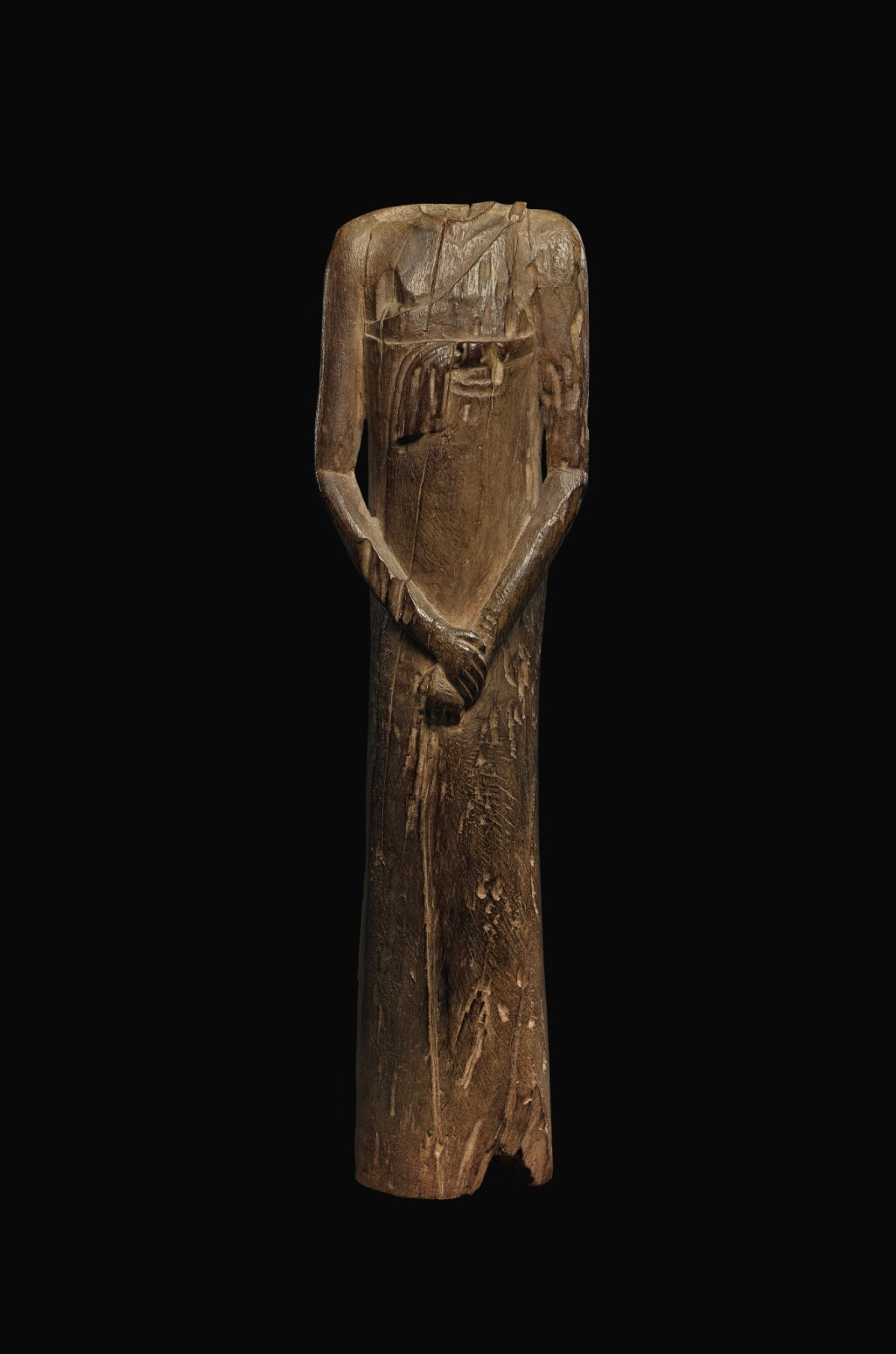 View full screen - View 1 of Lot 65. AN EGYPTIAN WOOD FIGURE OF A MAN, SECOND PERSIAN PERIOD, 342-332 B.C..