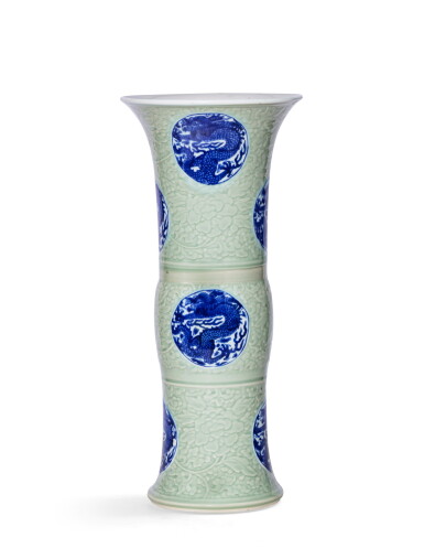 View full screen - View 1 of Lot 63. A very fine and rare celadon-ground blue and white beaker vase Qing dynasty, Kangxi period | 清康熙 粉青地印牡丹紋青花團龍紋花觚.