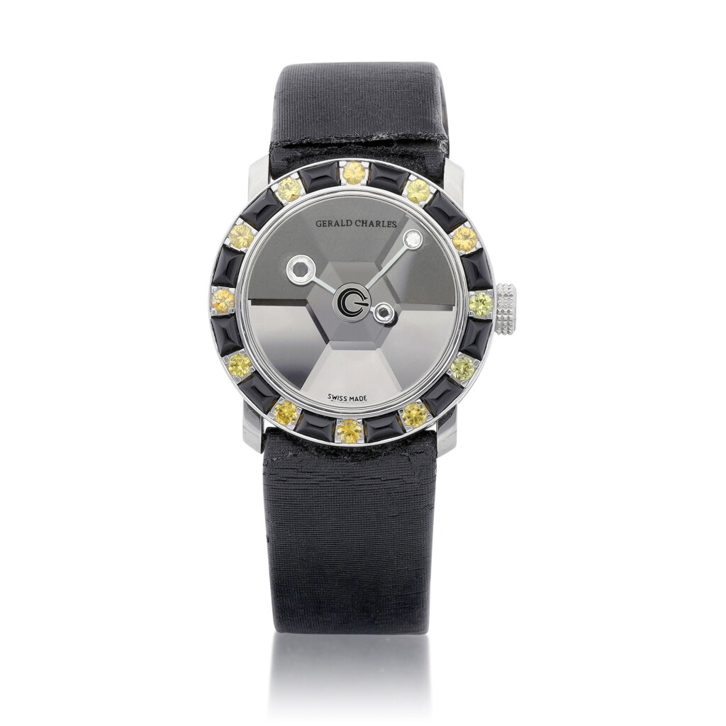 View full screen - View 1 of Lot 8143. Star Lady 30, Reference GC68, A stainless steel, diamond, yellow sapphire and onyx-set wristwatch with white gold bezel, Circa 1990 Star Lady 30 | 型號GC68 精鋼鑲鑽石、黃色寶石及瑪瑙腕錶,備白金錶圈,約1990年製.