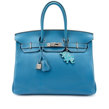 View full screen - View 1 of Lot 7726. Bleu Jean Clemence Birkin 35 Palladium Hardware, 2008 and Elephant Bag Charm.