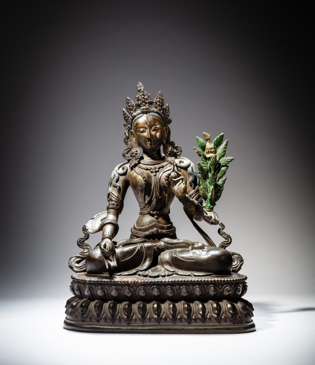 View full screen - View 1 of Lot 61. A bronze figure of white Tara, Qing dynasty, 18th century | 清十八世紀 銅白度母坐像.