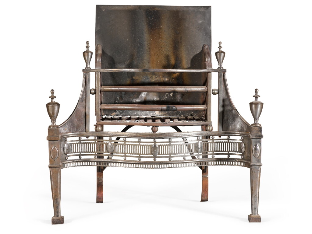 View full screen - View 1 of Lot 75. A GEORGE III POLISHED STEEL AND CAST IRON BASKET GRATE, CIRCA 1770.