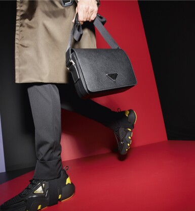 View full screen - View 1 of Lot 67. PRADA | SAFFIANO LEATHER BAG AND TECHNO SNEAKERS.