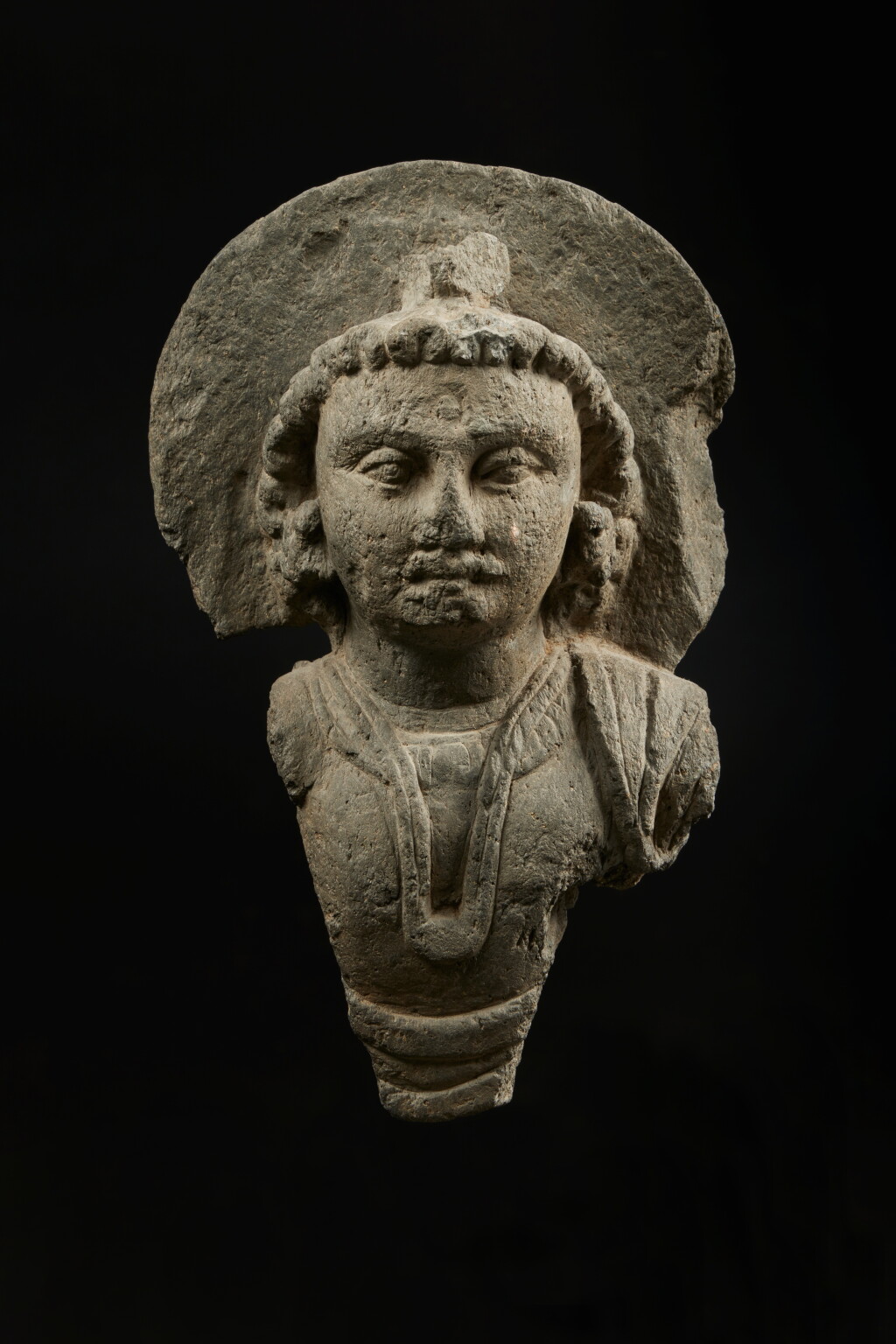 View full screen - View 1 of Lot 813. A gray schist bust of Maitreya, Ancient region of Gandhara, 3rd century.