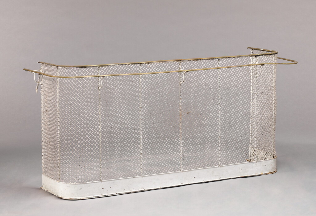 View full screen - View 1 of Lot 125. A Victorian wire and brass double-railed nursery fender, 19th century.