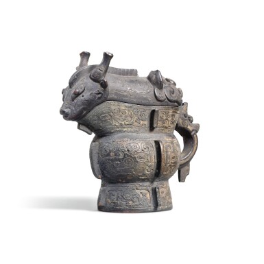 View full screen - View 1 of Lot 76. A MINIATURE ARCHAISTIC BRONZE VESSEL AND COVER, GUANG, QING DYNASTY | 清 銅仿古饕餮紋觥.