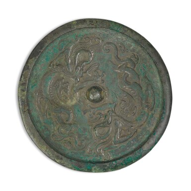 View full screen - View 1 of Lot 118. A bronze 'dragon' mirror, Song dynasty | 宋 銅龍紋鏡.