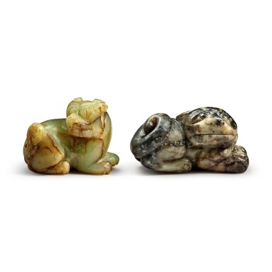 View full screen - View 1 of Lot 172. Two jade 'Buddhist lions' pendants, 20th century.