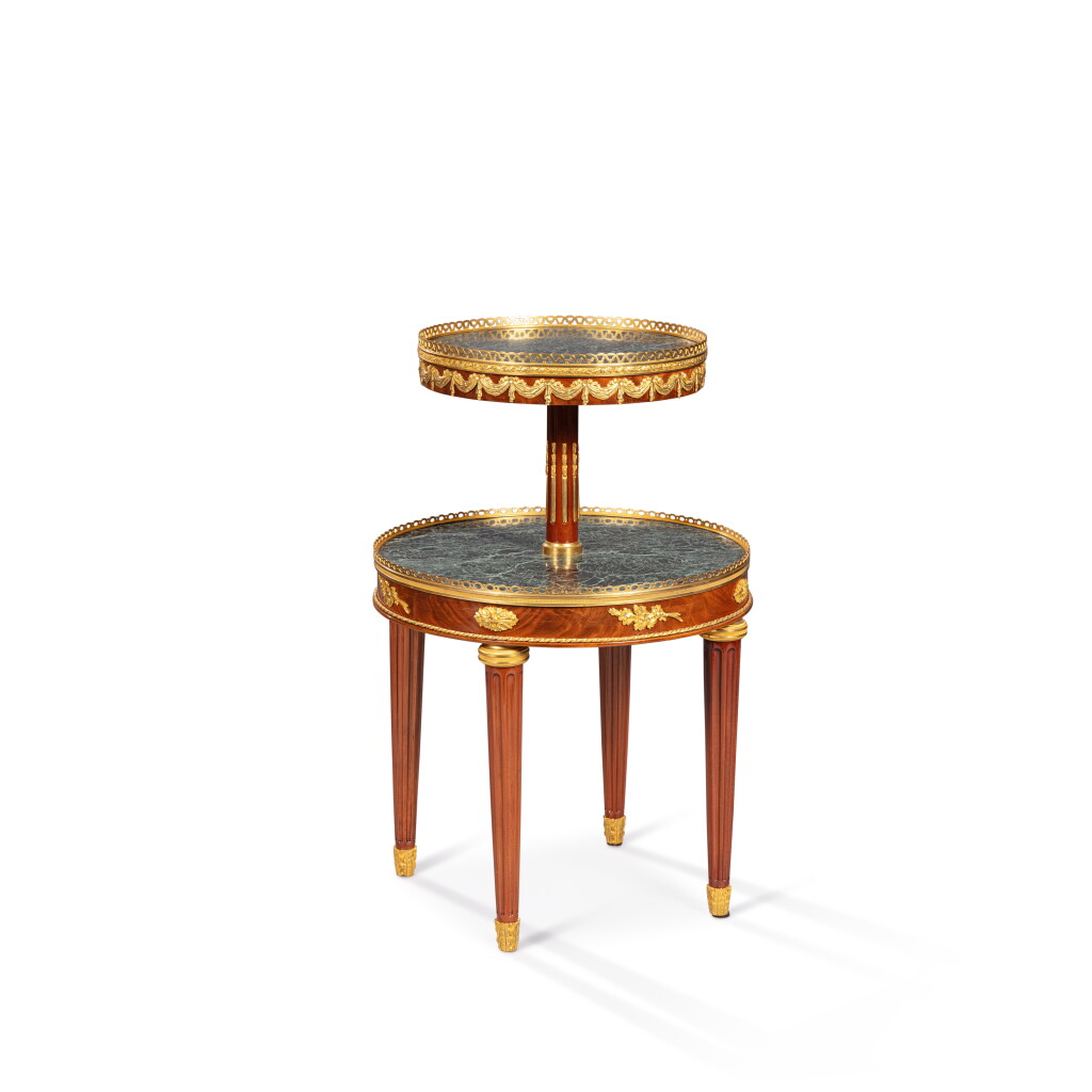 View full screen - View 1 of Lot 827. A Louis XVI style gilt-bronze mounted and mahogany tea table, late 19th century.