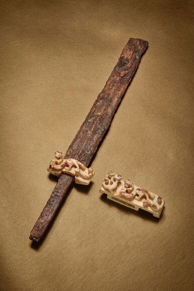 View full screen - View 1 of Lot 116. An iron sword with a jade 'chilong' sword guard and jade scabbard slide, Western Han dynasty.