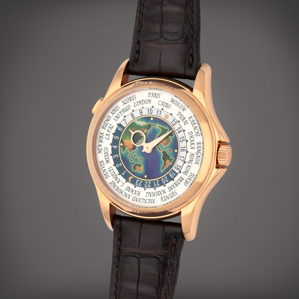 Voir en plein écran - Voir 1 du lot 7. World Time, Reference 5131R-010 | A pink gold world time wristwatch with cloisonné map of the world depicting East Asia, Oceania and the Americas | Circa 2016.