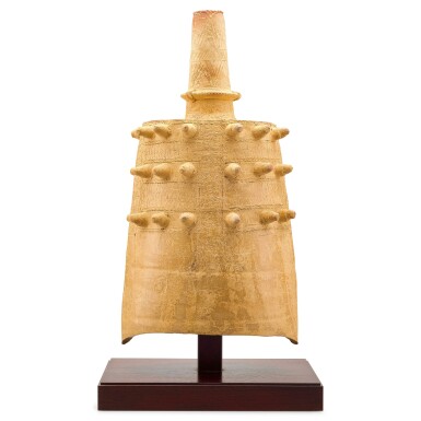 View full screen - View 1 of Lot 311. A RARE STRAW-GLAZED STONEWARE PERCUSSION BELL EASTERN ZHOU DYNASTY | 東周 陶鐘.