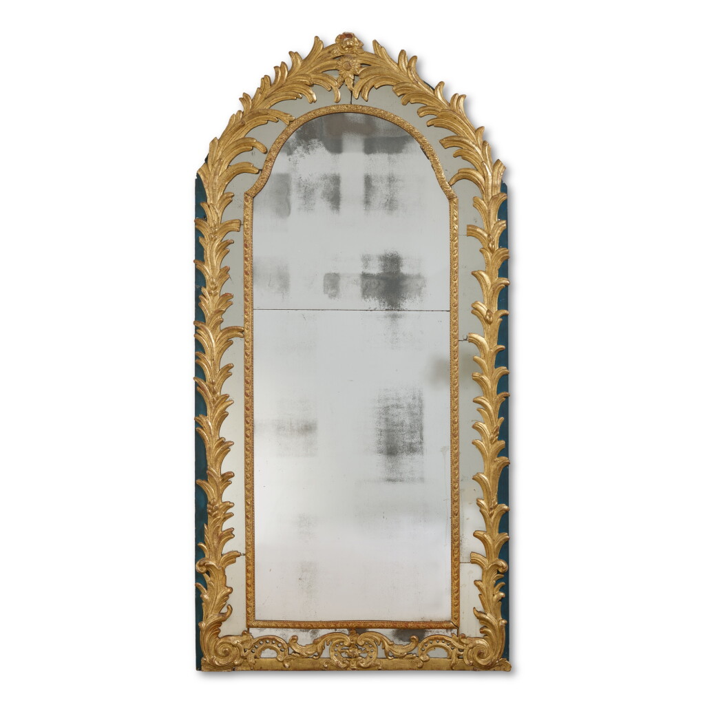 View full screen - View 1 of Lot 547. A Large Austrian Neoclassical Carved Giltwood Mirror, Last Quarter 18th Century .