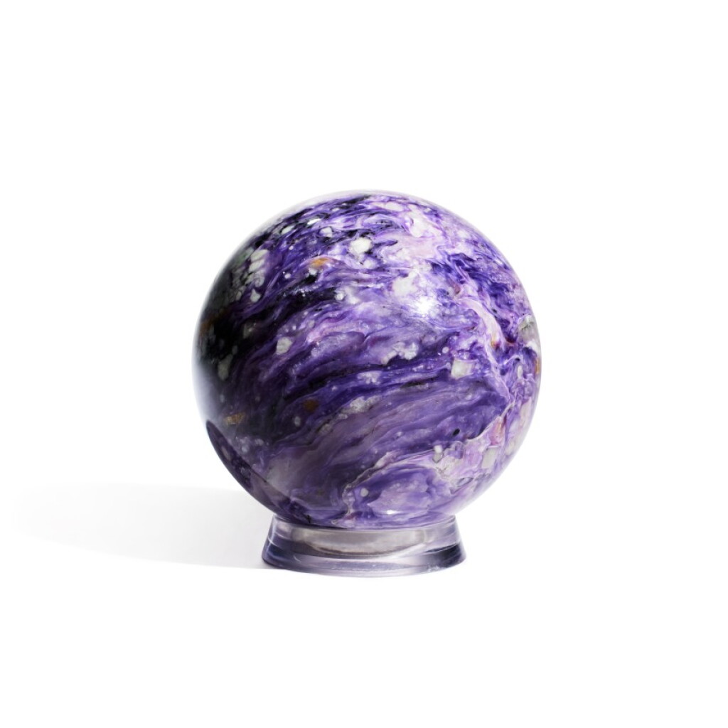 View full screen - View 1 of Lot 74. A Charoite Sphere.