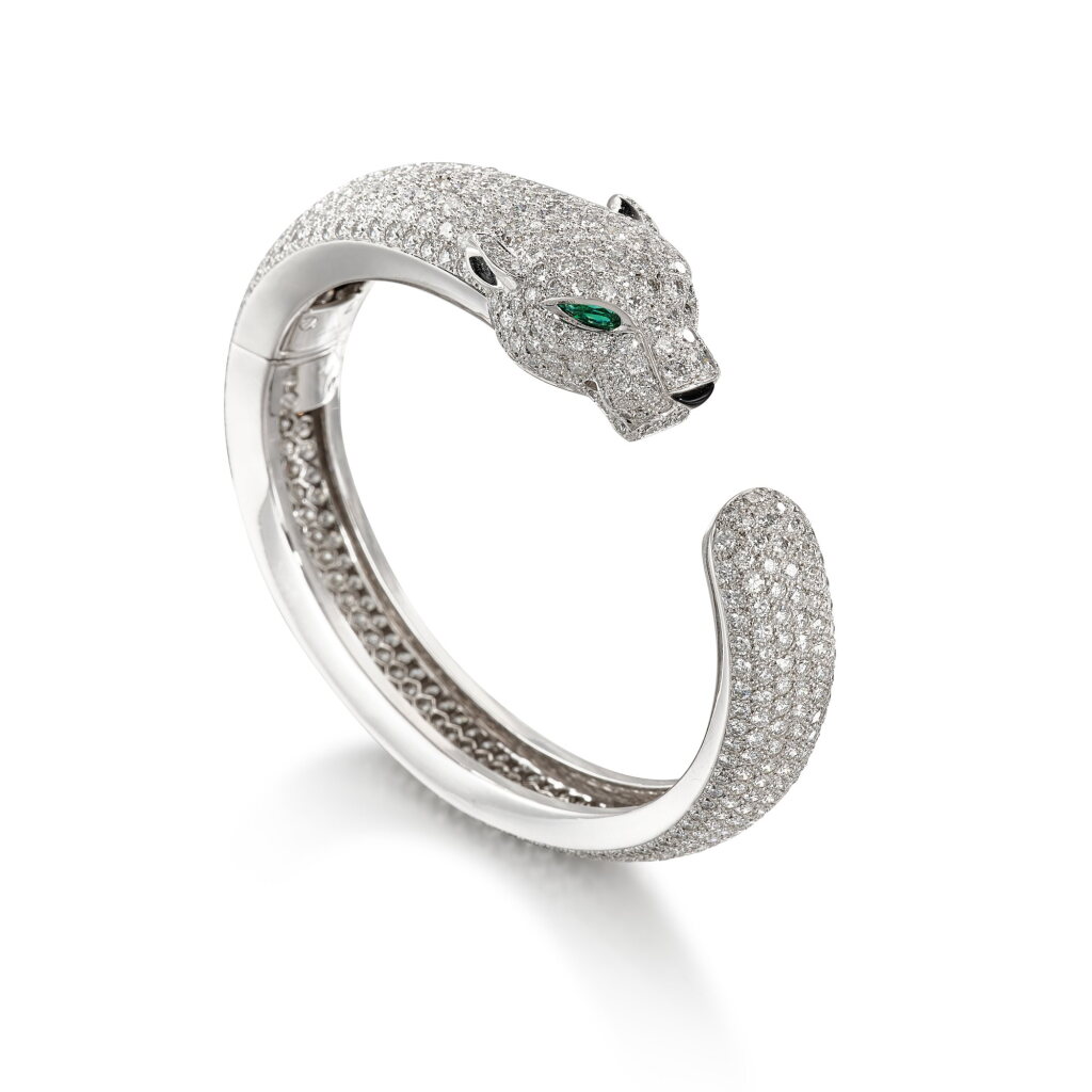 View full screen - View 1 of Lot 1821. 'Panthère' Diamond, Emerald and Onyx Bangle | 卡地亞 | 'Panthère' 鑽石 配 祖母綠 及 縞瑪瑙 手鐲.