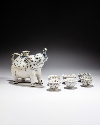 View full screen - View 1 of Lot 266. A blue and white elephant-form water dropper and six blue and white cups, Vietnam, Lê dynasty, 15th / 16th century.