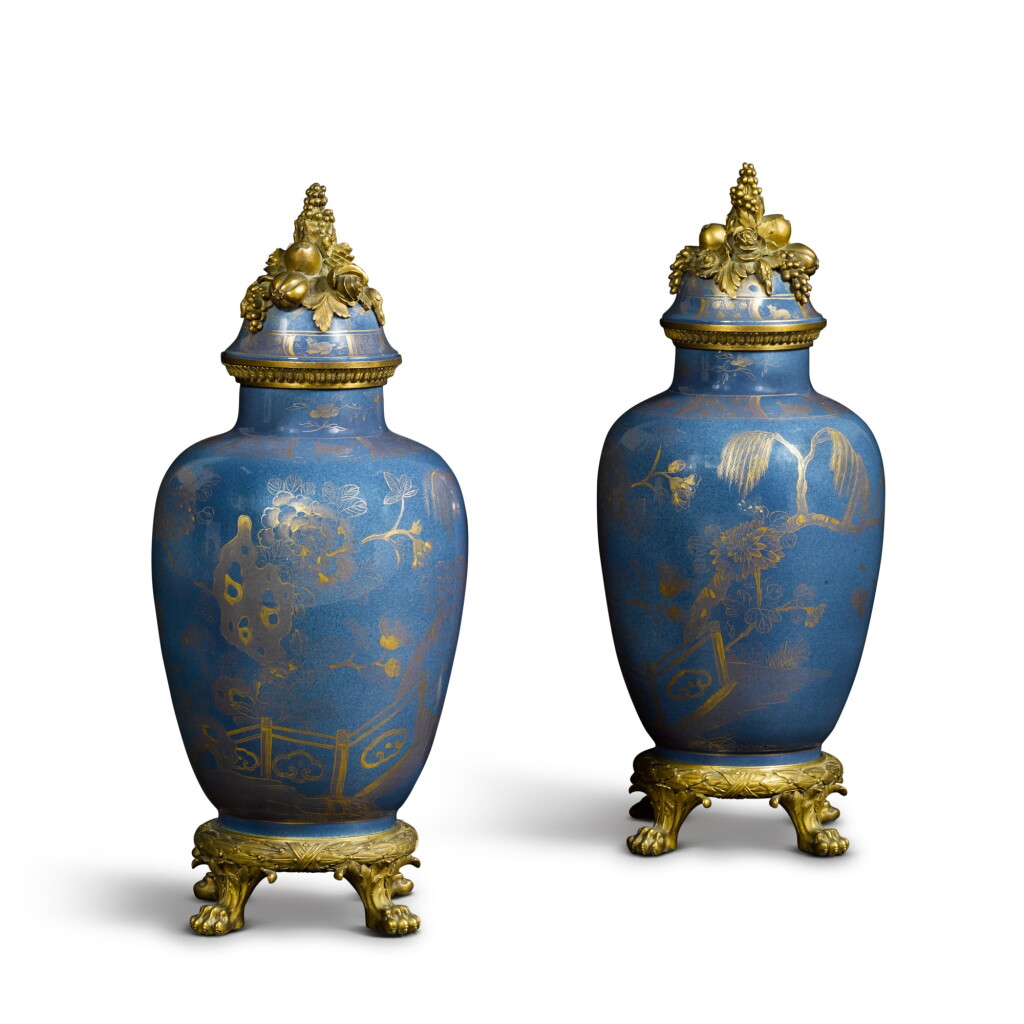 View full screen - View 1 of Lot 76. A pair of gilt-bronze mounted Chinese blue porcelain vases and covers, 19th century.