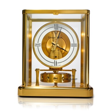 View full screen - View 1 of Lot 90. Atmos Retailed by Tiffany & Co: A gilt brass Atmos clock, Circa 1980.