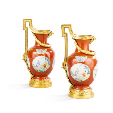 View full screen - View 1 of Lot 443. A pair of Louis XVI gilt-bronze mounted Chinese porcelaine ewers, 18th century.