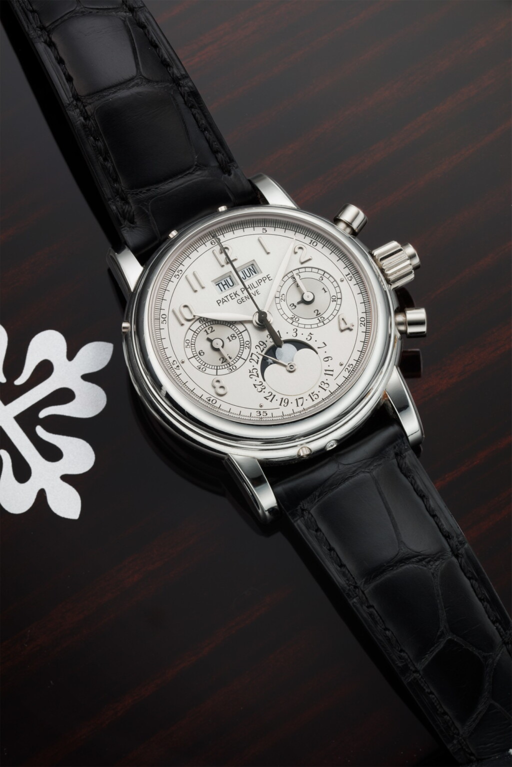 View full screen - View 1 of Lot 176. REFERENCE 5004P A FINE PLATINUM PERPETUAL CALENDAR SPLIT-SECONDS CHRONOGRAPH WRISTWATCH WITH MOON PHASES, 24 HOURS, AND LEAP YEAR INDICATION, CIRCA 2015.