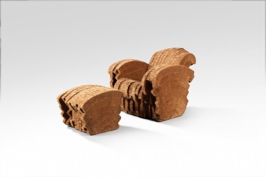 View full screen - View 1 of Lot 118. Little Beaver armchair and ottoman.