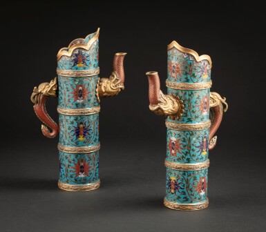View full screen - View 1 of Lot 177. A pair of gilt copper alloy and cloisonné enamels Tibetan ewers Late Qing dynasty| 清晚期 掐絲琺瑯纏枝蓮紋多穆壺一對.