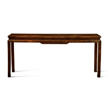 View full screen - View 1 of Lot 215. A Ming-style 'huanghuali' corner-leg table (Tiaozhuo), Late Qing dynasty | 清末 黃花梨雕仿古紋有束腰馬蹄足條桌.