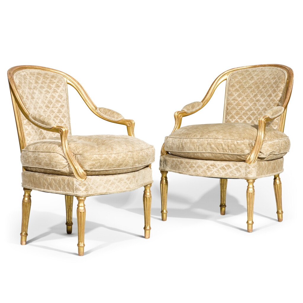 View full screen - View 1 of Lot 22. A pair of George III style giltwood armchairs, 19th century.