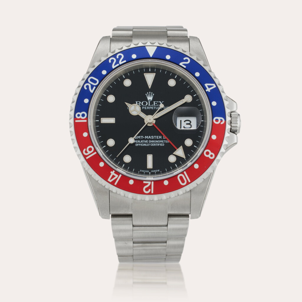 View full screen - View 1 of Lot 404. Reference 16710 GMT-Master II ‘Pepsi’ | A stainless steel automatic dual time wristwatch with date and bracelet, Circa 2004.