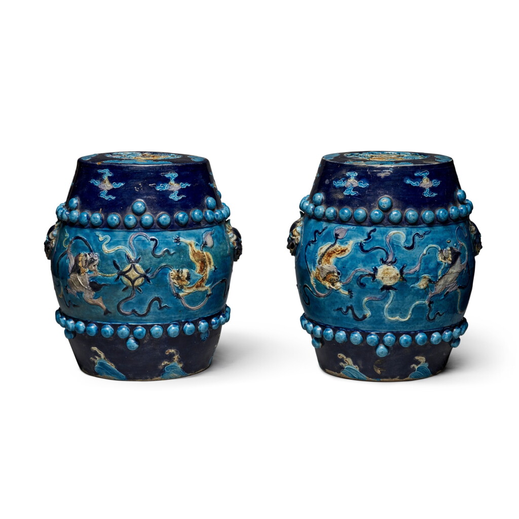 View full screen - View 1 of Lot 633. A pair of Fahua-glazed 'Buddhist lions' garden seats, Ming dynasty, 16th century | 明十六世紀 琺華雙獅戲球紋坐墩一對.