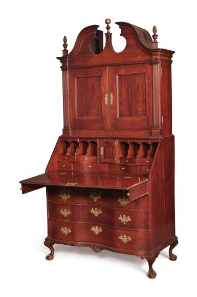 View full screen - View 1 of Lot 64. Chippendale Carved Cherrywood Reverse-Serpentine Bonnet-Top Slant-Front Desk-and-Bookcase, Connecticut, circa 1785.