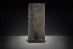 An impressed gray pottery 'mask' tomb tile, Western Han dynasty