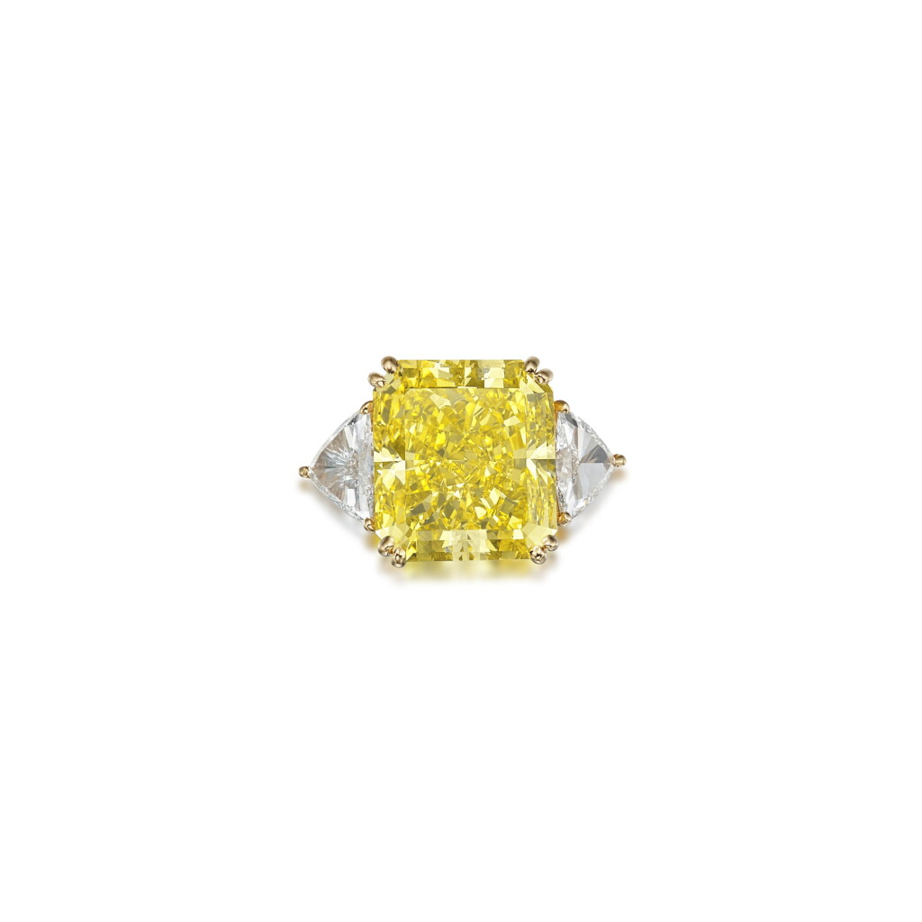 View full screen - View 1 of Lot 50. An Important Fancy Intense Yellow Diamond and Diamond Ring.