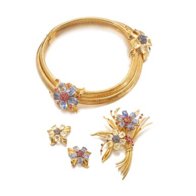 View full screen - View 1 of Lot 570. Attractive sapphire, yellow sapphire and ruby parure, 'Passe-Partout', circa 1939-1940.
