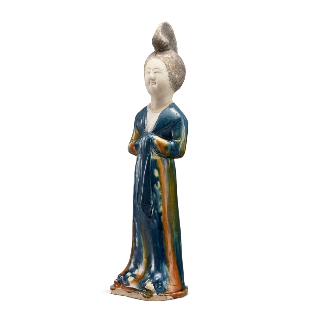 View full screen - View 1 of Lot 805. A rare blue-splashed sancai-glazed figure of a court lady Tang dynasty | 唐 三彩藍釉仕女立俑.