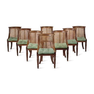 View full screen - View 1 of Lot 594. A Set of Eight Regency Caned Mahogany Side Chairs of Barrel-Back Form, Circa 1815.
