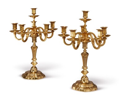 View full screen - View 1 of Lot 120. A PAIR OF FRENCH REGENCE STYLE GILT BRONZE SIX-LIGHT CANDELABRA.