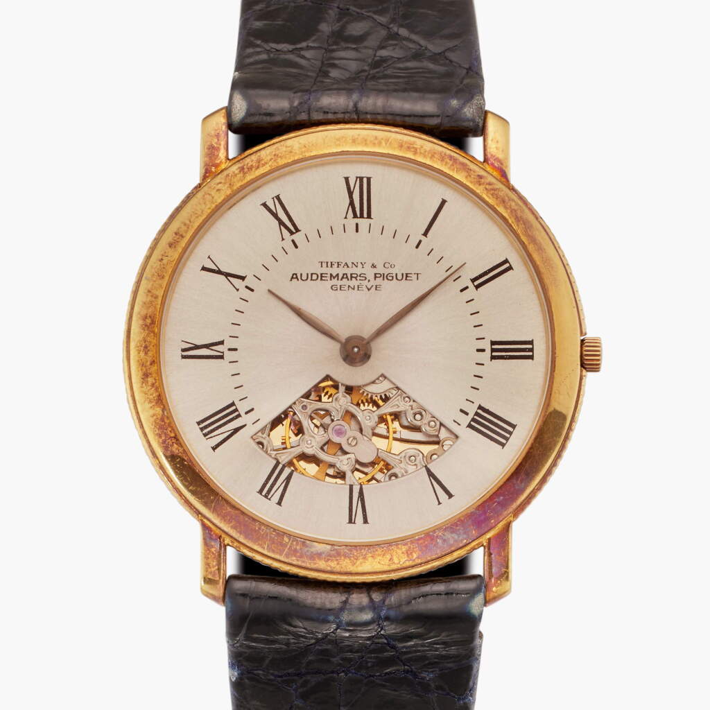 View full screen - View 1 of Lot 164. Reference 14530 | Retailed by Tiffany & Co.: A yellow gold semi-skeletonized wristwatch, Circa 1990.