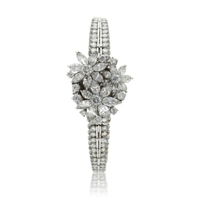 View full screen - View 1 of Lot 96. A lady's platinum diamond set cocktail wristwatch on diamond link bracelet, Circa 1960.