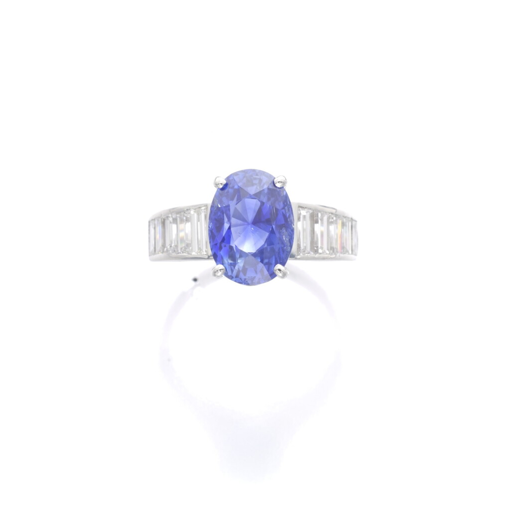 View full screen - View 1 of Lot 428. SAPPHIRE AND DIAMOND RING.