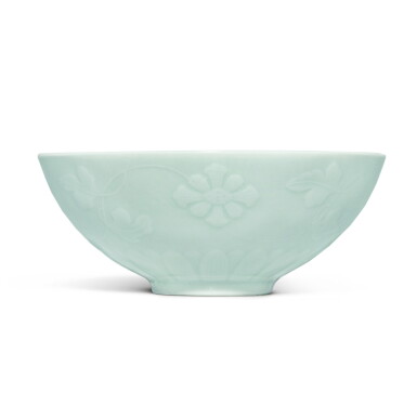 View full screen - View 1 of Lot 4. A fine molded celadon-glazed 'floral' bowl, Mark and period of Yongzheng | 清雍正 粉青釉浮雕纏枝花卉紋盌 《大清雍正年製》款.