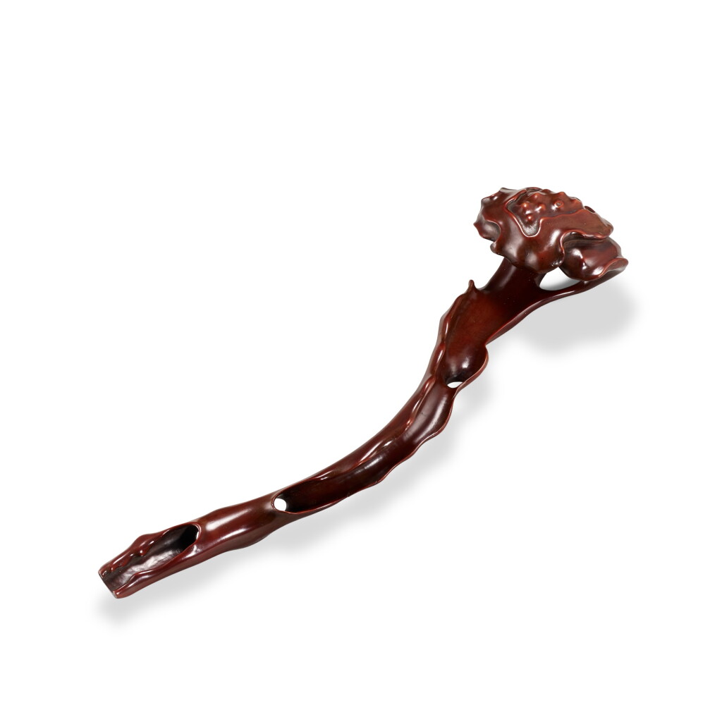 View full screen - View 1 of Lot 5903. A boxwood ruyi sceptre, Qing dynasty, 17th - 18th century | 清十七至十八世紀 黃楊木雕如意.