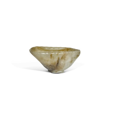 View full screen - View 1 of Lot 62. A russet jade 'lotus leaf' vessel, Yuan dynasty.