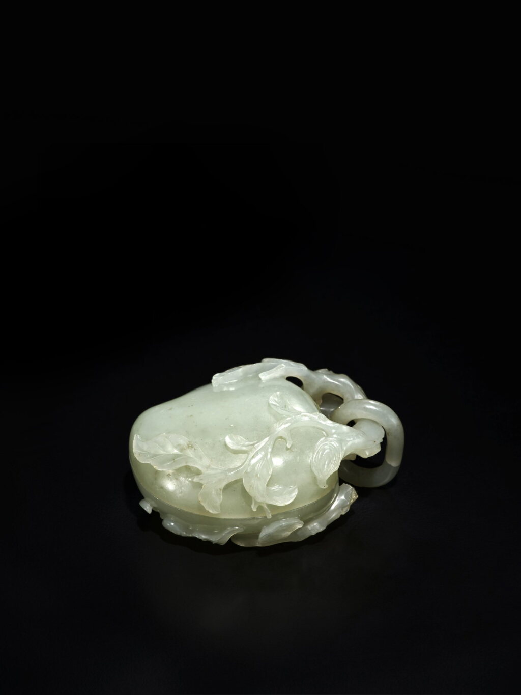 View full screen - View 1 of Lot 291. A small white jade 'peach' box and cover, Qing dynasty, Qianlong period | 清乾隆 白玉雕福壽雙全小盒.