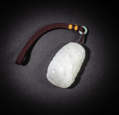 View full screen - View 1 of Lot 86. A carved white jade 'birds and flowers' pebble, Modern.