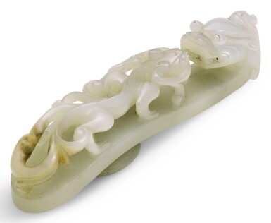 View full screen - View 1 of Lot 366. A PALE CELADON JADE 'DRAGON' BELT HOOK QING DYNASTY, 19TH CENTURY | 清十九世紀 青白玉龍紋帶鉤.
