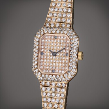 View full screen - View 1 of Lot 273. Reference 4629/1 | A yellow gold and diamond and sapphire-set bracelet watch, Circa 1990.