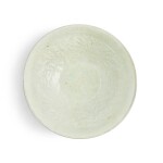 A molded Qingbai 'phoenix and flower' bowl, Yuan dynasty