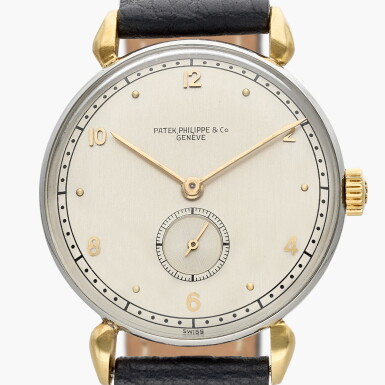 View full screen - View 1 of Lot 678. Reference 1461 Calatrava | A stainless steel and yellow gold wristwatch, Circa 1942.